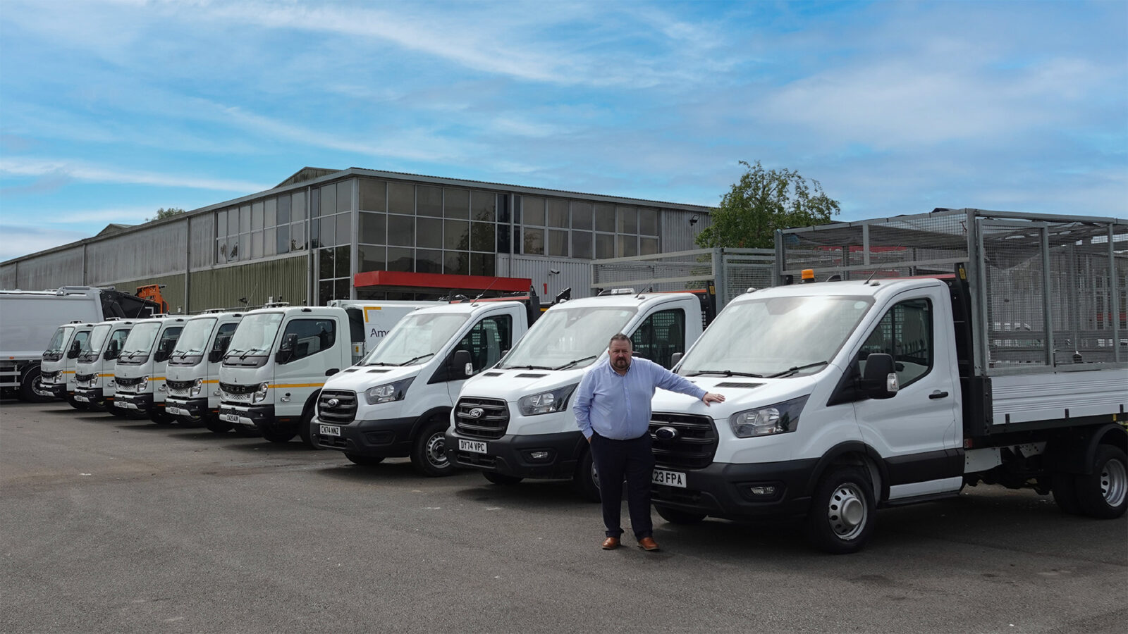 Stewart Gregory in front of the new Endurance vehicle fleet