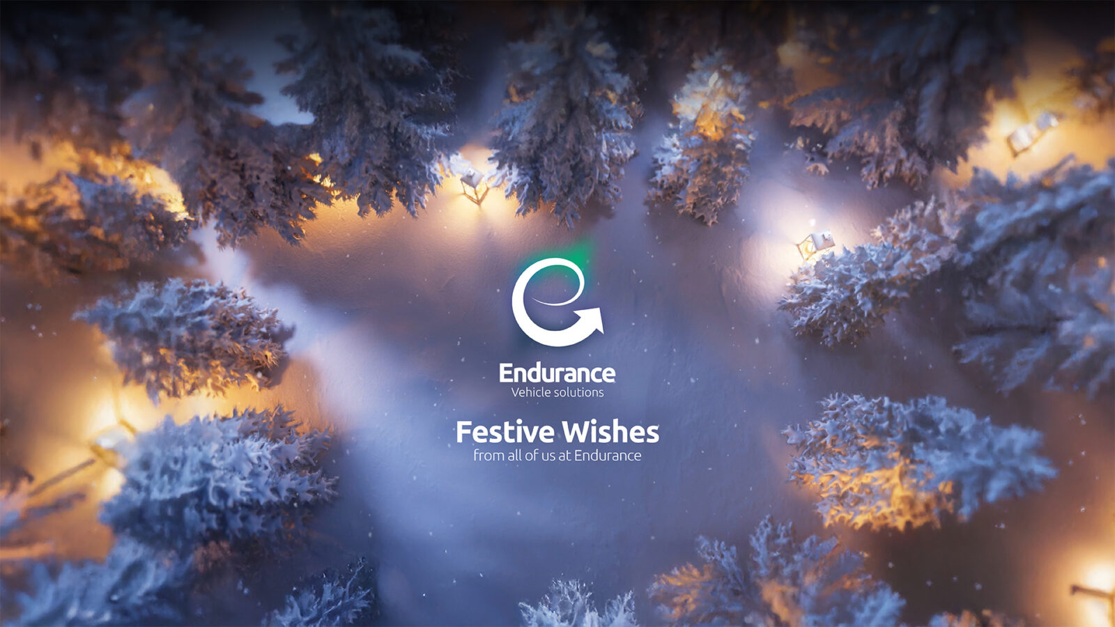 Snowy woodland scene with warm lamps glowing amongst trees